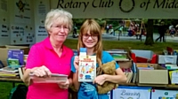 Middleton Rotary Club gave free books to children, as part of the Buzzing Book Bonanza at Middfest 2018